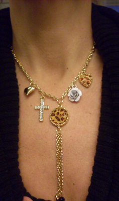 Betsey Johnson necklace leopard and cross.