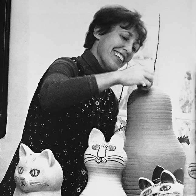 Lisa Larson working on large unique cats