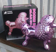 Pink dog coin bank metallic.