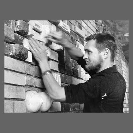 Erik Höglund working with bricks in the 1960s