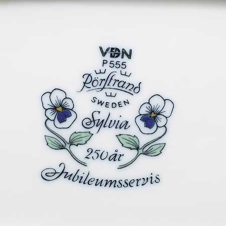 Sylvia Leuchovius Sylvias stämpel och Rörstrands logotyp