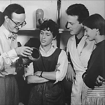 Lisa Larson with fellow apprentices and mentor Stig Lindberg