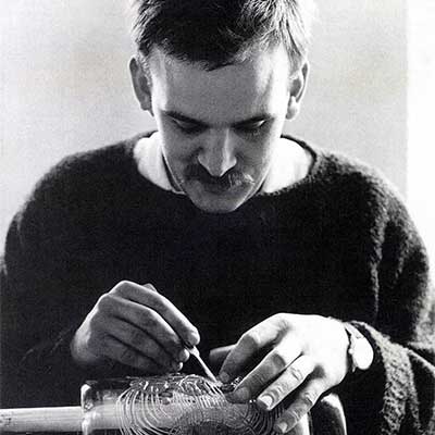 Bertil Vallien at work on a glue-painted vase before sandblasting